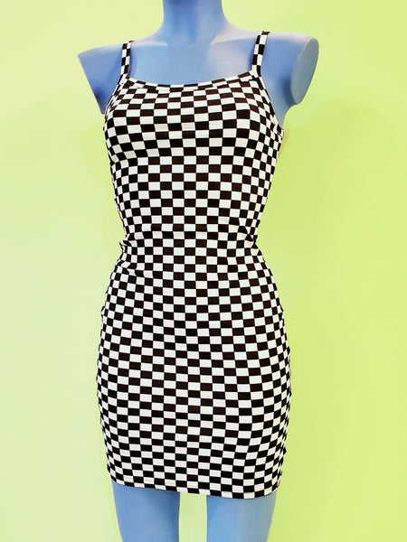 black and white checker print bodycon mini dress with spaghetti straps. shown on a blue mannequin