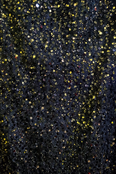 black sequin and allover printed metallic gold scatter dots black velvet mini dress fabric swatch close up