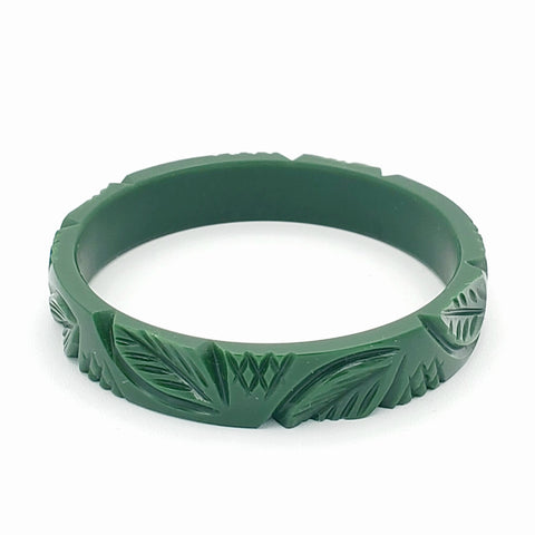 pine green resin bangle with carved in allover leaf design