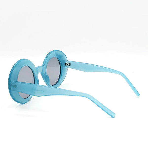 pair of cartoony semi-translucent retro round sunglasses with thick frames in a dusty robin’s egg blue and vertical oval shaped dark smoke lenses, shown 3/4 back view