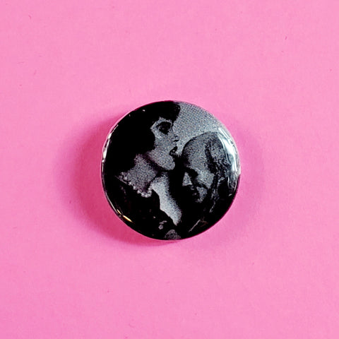 black and white photo of Dr. Frank N. Furter and Riff Raff posed on a 1” round pinback button