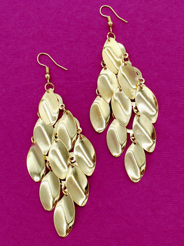 gold metal dangle earrings of stylized leaf shapes staggered together with jump rings