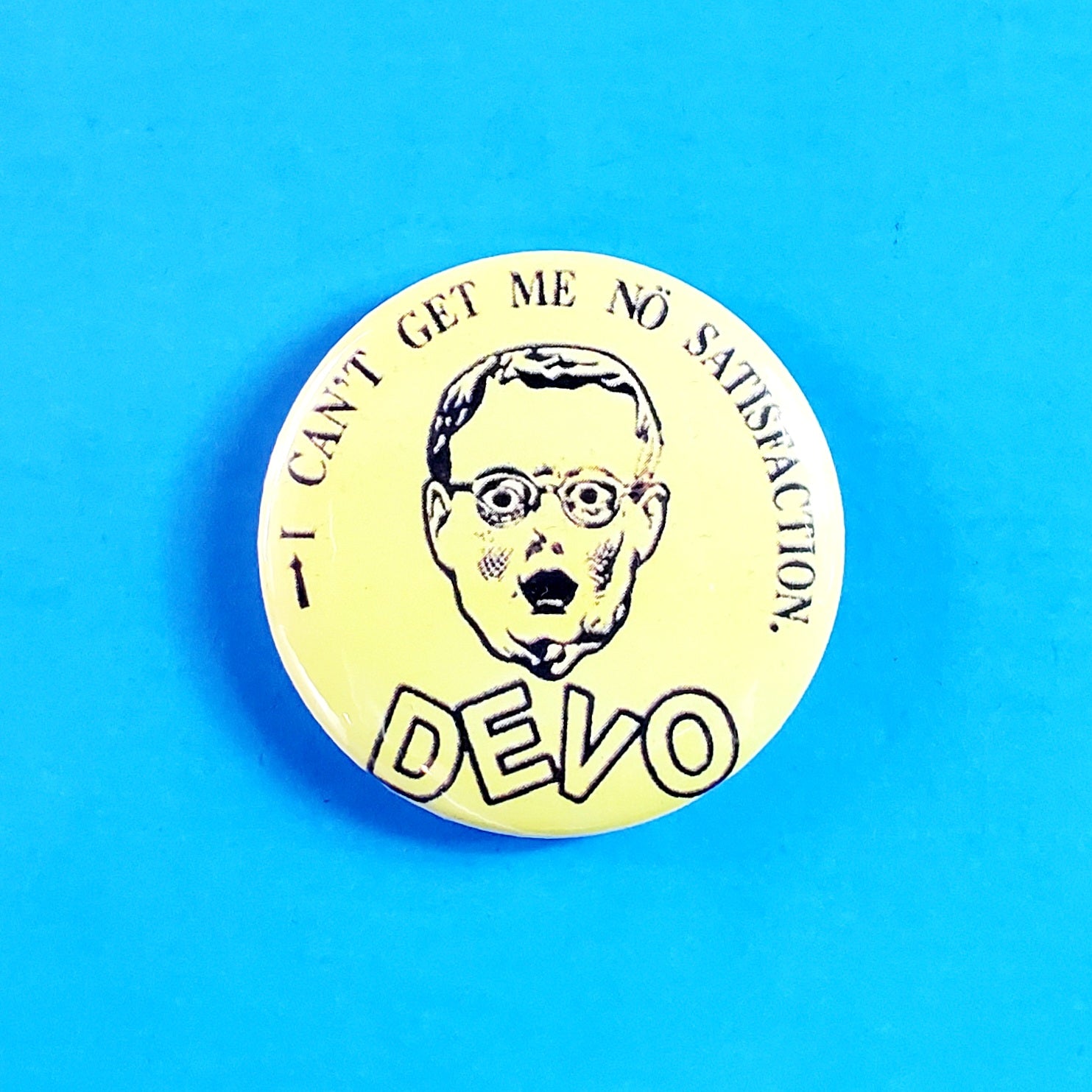 Devo “I Can’t Get Me No Satisfaction” 2.25" Button