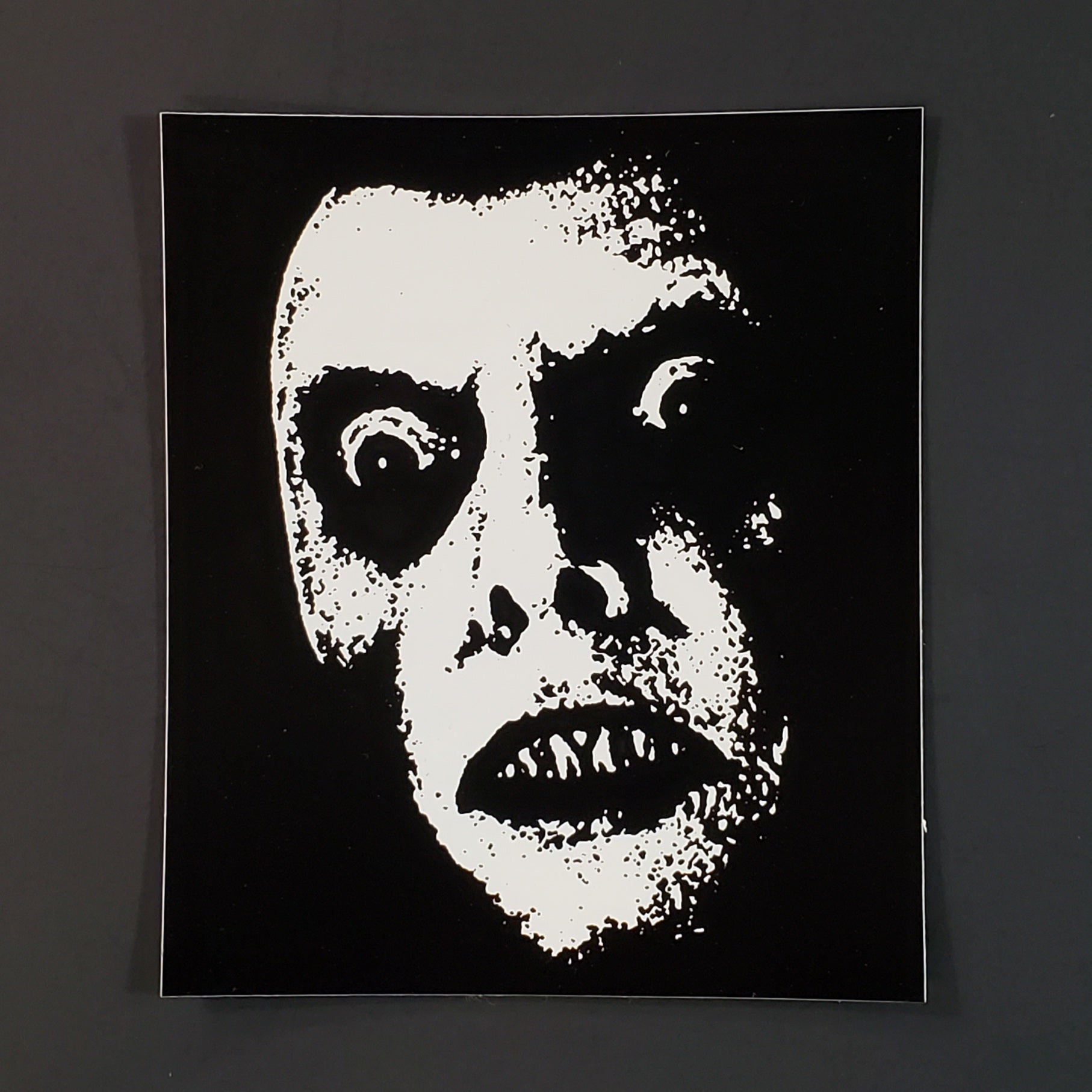 Black and white vinyl sticker of Pazuzu/Captain Howdy from The Exorcist