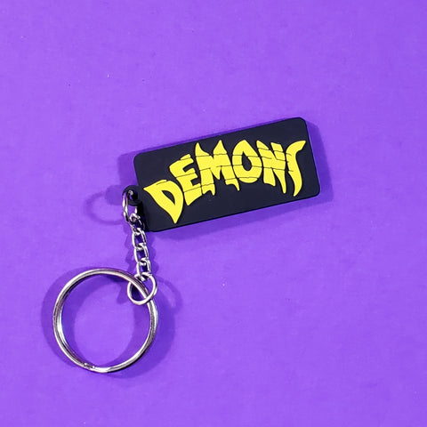 Logo for the movie Demons soft touch bright yellow and black PVC keychain with silver o-ring and chain
