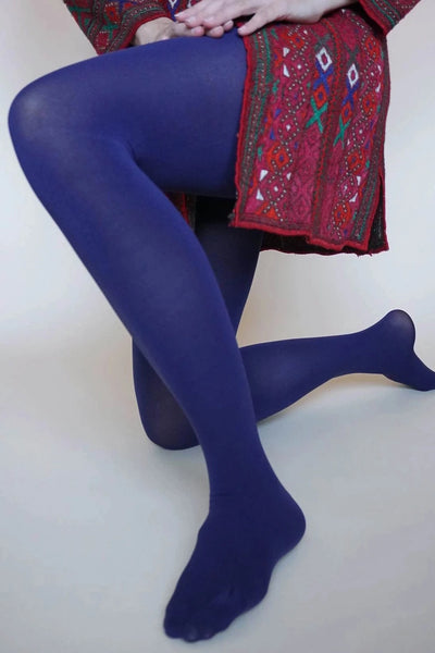 80 denier matte finish "Zokki" opaque tights in rich navy blue, shown worn by a model