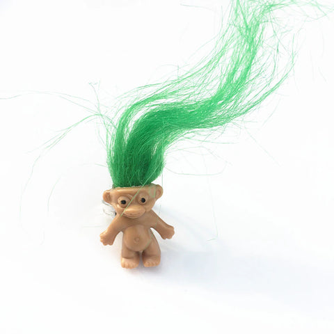 mini troll doll with neon green hair on an adjustable silver metal ring