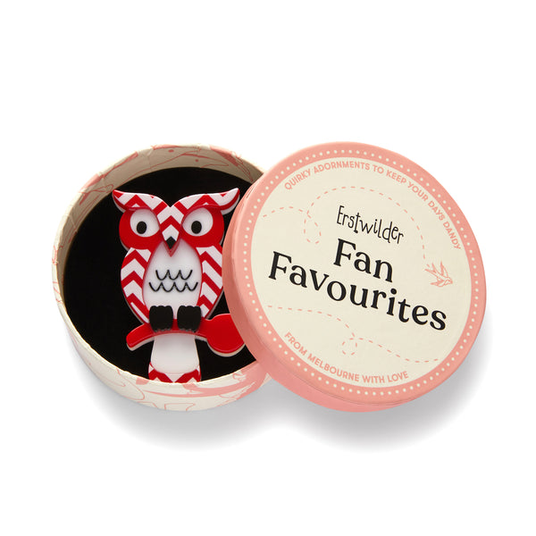 Fan Favourites Collection "Howard’s Hoot” red, white, and black chevron patterned owl brooch shown in round illustrated gift box