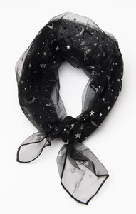 Black mesh square scarf with silver printed pattern of crescent moons, stars, and dots. Shown tied