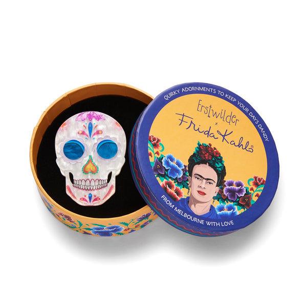 Frida Kahlo Collection “Dia De Los Muertos” layered resin calavera brooch, show in illustrated round box packaging
