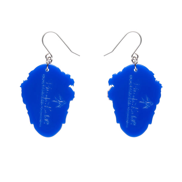 pair Frida Kahlo Collection “My Own Muse Frida” layered resin portrait dangle earrings, showing blue backing layer