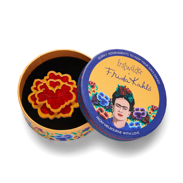 Frida Kahlo Collection “Flower of Life” red blossom with metallic gold outline details layered resin brooch, shown in illustrated round box packaging