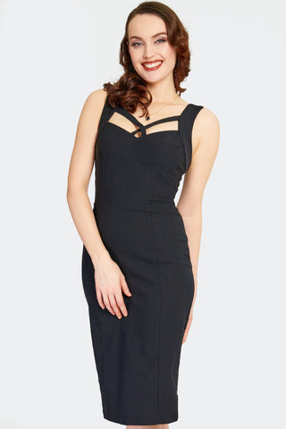 a model wearing a black bengaline sleeveless wiggle dress with vertical seaming, a sweetheart neckline, and crossed strap detailing in the front. Shown from the front