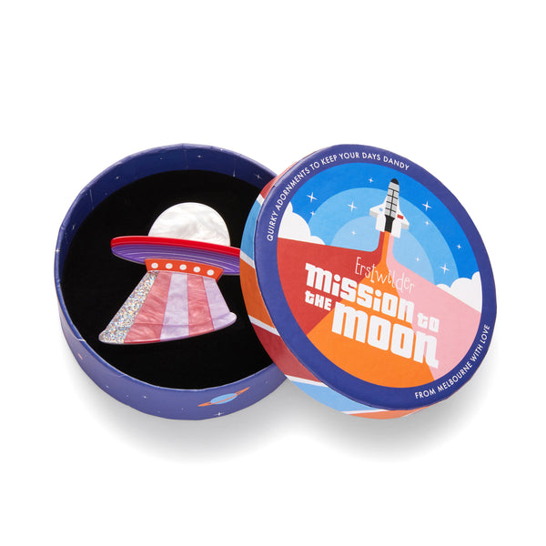 Mission to the Moon Collection "Beam Me Up” layered resin flying saucer brooch, shown in illustrated round box packaging