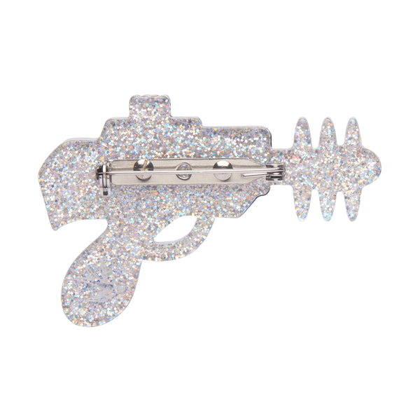 Mission to the Moon Collection "Pew Pew” layered resin retro raygun brooch, showing solid silver glitter back view