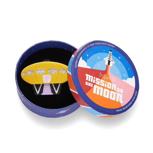 Mission to the Moon Collection "Hotel Futura” layered resin 1960s prefabricated house Futuro Pod brooch, shown in illustrated round box packaging