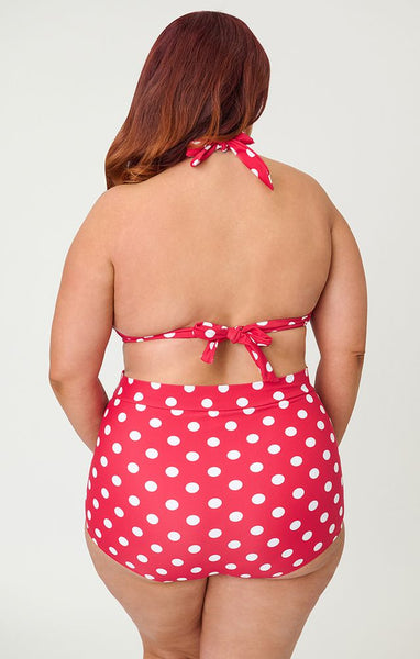 Red and white polka dot patterned halter style bikini top with front bow detail, shown on plus size model from back