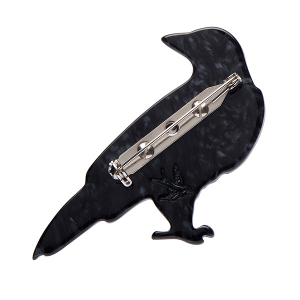 Erstwilder's Spellbound collection "Black as Night" raven layered resin brooch, showing solid black reverse