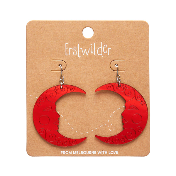 pair Spellbound Essentials Collection crescent moon dangle earrings in shiny etched mirror finish red 100% Acrylic resin, shown on branded backer card packaging