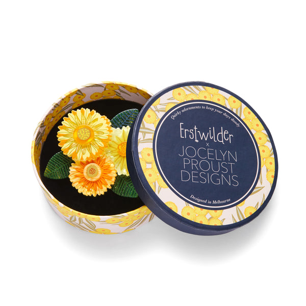 Jocelyn Proust Collaboration Collection "Forever and Ever" layered resin trio of yellow blooms brooch, shown in illustrated round box packaging