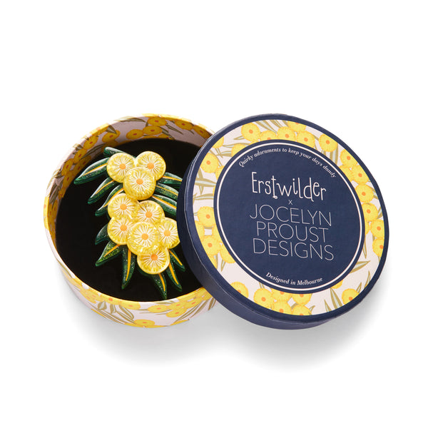 Jocelyn Proust Collaboration Collection "Acacia in Gold" layered resin brooch, shown in illustrated round box packaging