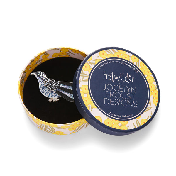 Jocelyn Proust Collaboration Collection "Booming Bloom Lover" layered resin black and white bird brooch, shown in illustrated round box packaging