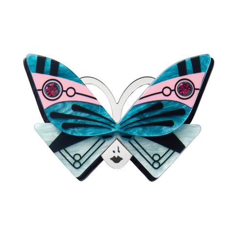 Untamed Elegance Collection "Butterfly Sonata" blue, pink, black, white, and mirror finish silver layered resin brooch depicting an Art Deco style butterfly as a mask on a lady's face