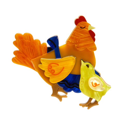 Hoppy Easter Collection “Mother Hen Knows Best” light brown hen in blue apron standing next to yellow chick layered resin brooch