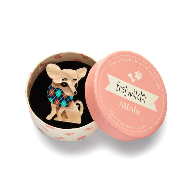 Dog Minis Collection "Chi Chi Chihuahua" seated tan dog wearing argyle print bandana layered resin brooch, shown in illustrated round box packaging