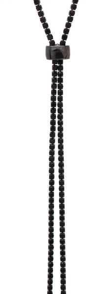 lariat style necklace made of tiny black rhinestones with a shiny gunmetal colored slider. Shown in close up
