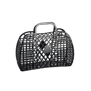 A small black rectangular handbag made of plastic with a retro diamond and lattice pattern