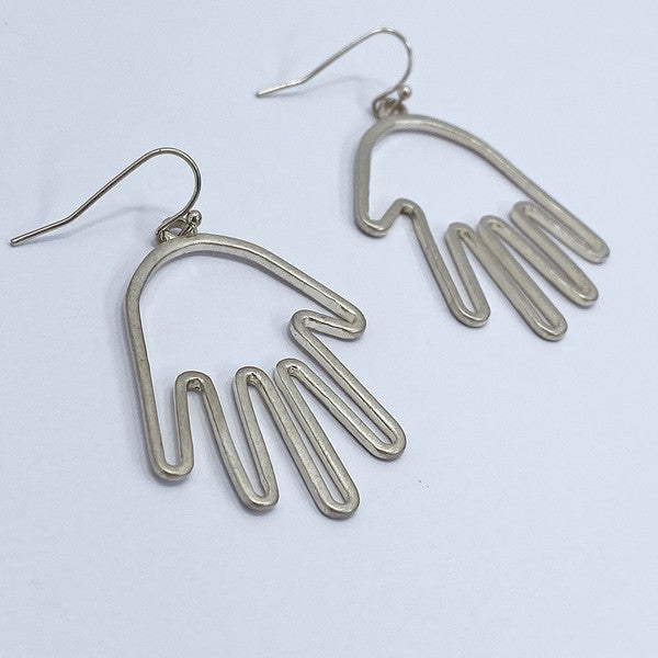 A pair of silver metal dangle earrings in the shape of a pair of stylized hand outlines