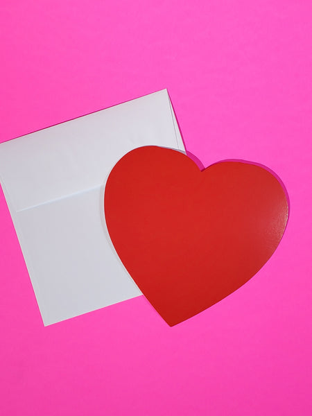 bright red heart shaped die-cut note card, shown with white envelope