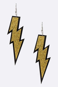 pair layered gold glitter and black lightning bolt earrings