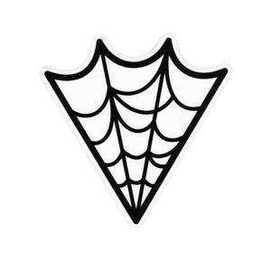 A die cut sticker of a black spiderweb on a clear background