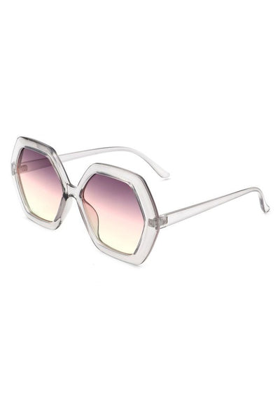 large hexagon shape plastic frame sunglasses in transparent grey with gradient rosy smoke lens, shown 3/4 view