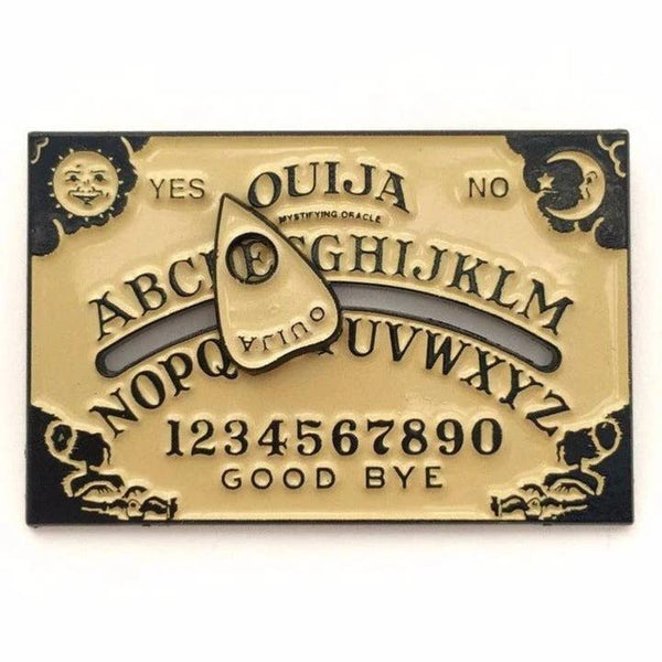 black nickel metal and tan enamel Ouija Board lapel pin with attached sliding planchette