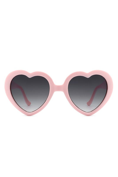 Pale pink plastic frame heart-shaped sunglasses with gradient smoke lenses
