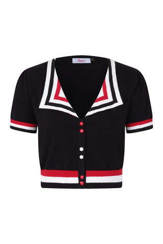 short sleeve v-neck cardigan in black, red, and white with alternating sets of red and white buttons, striped band detail at waist and sleeves, and geometric design collar