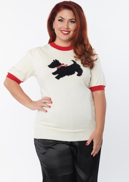 cream colored sweater with contrast red band finish at the crew neck and short puffed sleeves, 3-button closure at the nape, and fuzzy knit-in Scottie Dog with red bow, shown on model