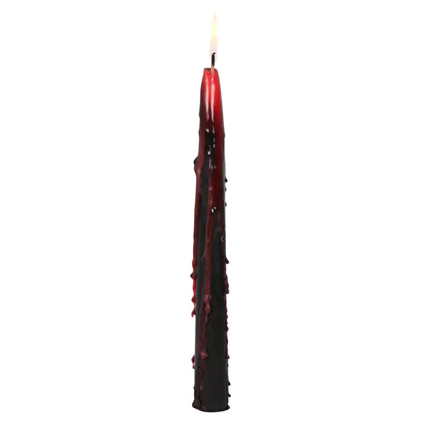 A black 10” tapered candle that drips bloody red when lit. Shown lit