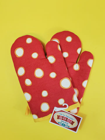 cotton oven mitt set in red with creamy white toadstool mushroom cap "dots" print with golden yellow trim