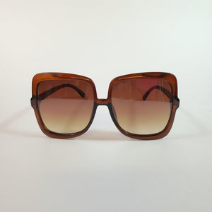large square shiny translucent brown plastic frame sunglasses with gradient brown lens