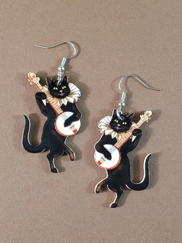 pair vintage-style dancing black cats wearing fancy ruffs and playing banjos acrylic dangle earrings