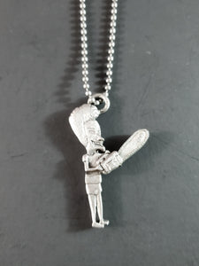 Beavis and Butt-Head deadstock necklace featuring pewter Beavis wielding a chainsaw pendant strung on 26" ballchain.