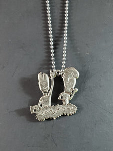Beavis and Butt-Head deadstock necklace featuring a pewter pendant of the duo headbanging strung on 26" ballchain