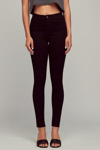 high waist black stretch denim 5 pocket skinny leg jeans, shown waist down on model
