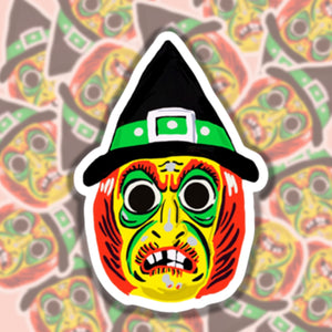 Die cut vinyl sticker of a vintage style witch Halloween mask in bright neon colors