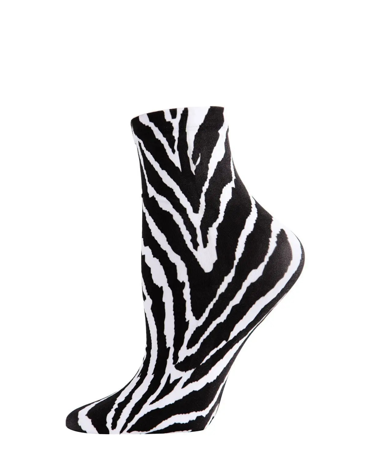 A mannequin foot wearing a black and white zebra print ankle length sock 