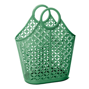 A large olive green plastic purse with two round interlocking handles, a flat base, and a diamond and grid pattern 